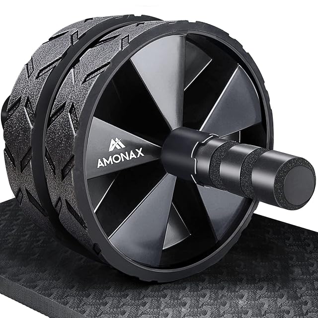 Amonax twin-wheel ab roller with a chevron-treaded tyre and foam handle, resting on a black knee mat