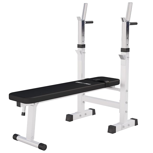 GORILLA SPORTS flat black bench on a white steel frame, with two height-adjustable barbell uprights behind it