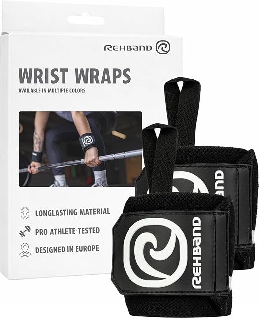 Rehband black wrist wraps in front of their box, which reads pro athlete-tested and designed in Europe